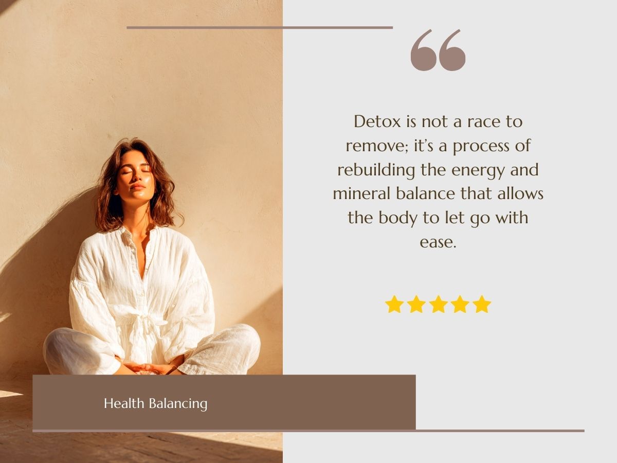 Woman sitting peacefully in meditation during a health balancing detox, emphasizing energy restoration and mineral balance for holistic wellness.