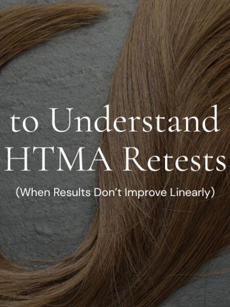 Close-up of strands of brown hair arranged in loops on a textured surface, representing a hair tissue mineral analysis (HTMA) test concept